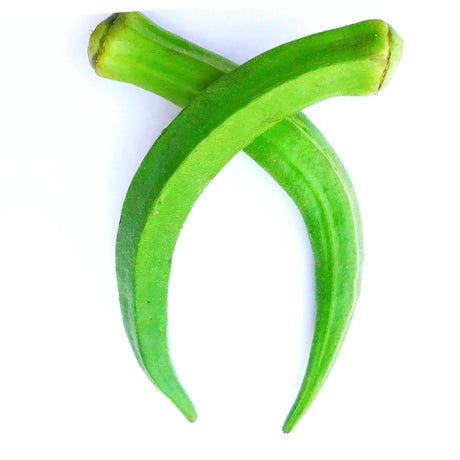 Curved Cow Horn okra pods isolated on a white background