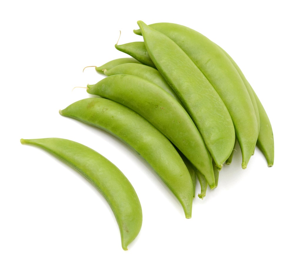 Plump sugar snap pea pods on a clean background