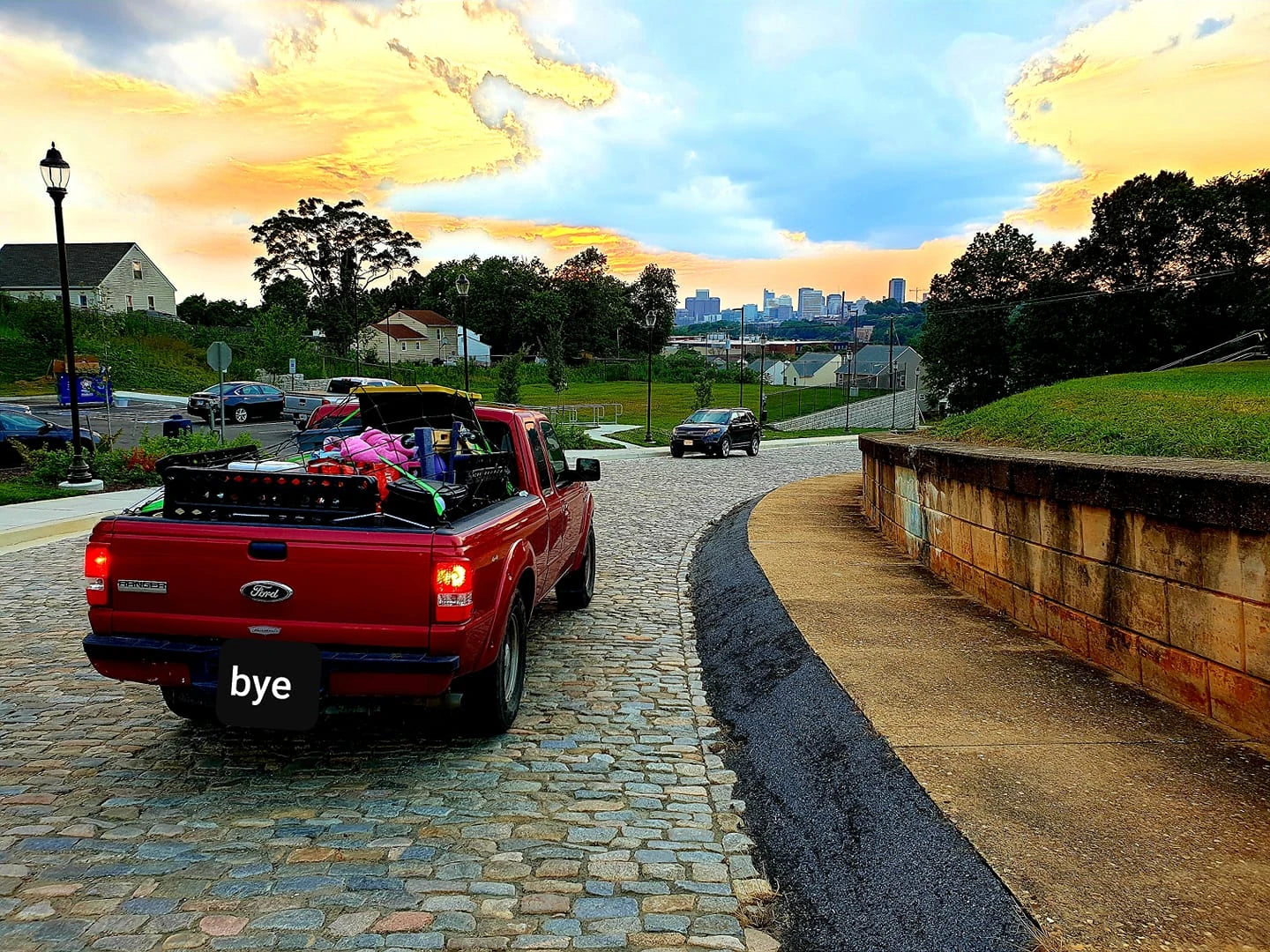 Beth in the red Ford Ranger during the move from Richmond back to North Carolina