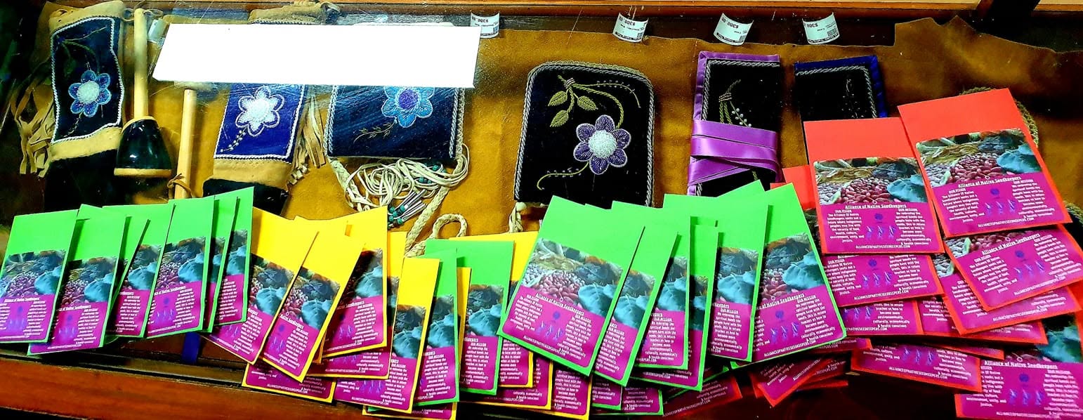 Colorful Alliance of Native Seedkeepers packets displayed inside another store in 2022