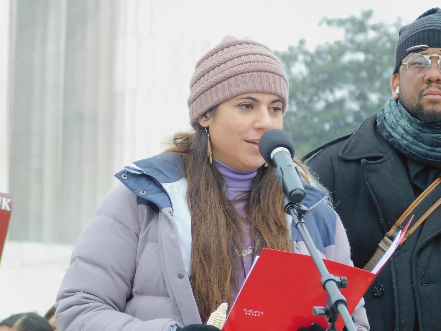 Elizabeth Beth Roach Cain speaking in front of the Lincoln Memorial at a separate invited event