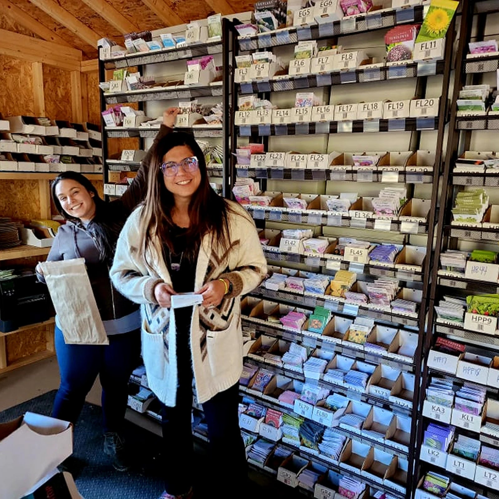 Bertie County Seeds seed room with shelves of heirloom seed packets.